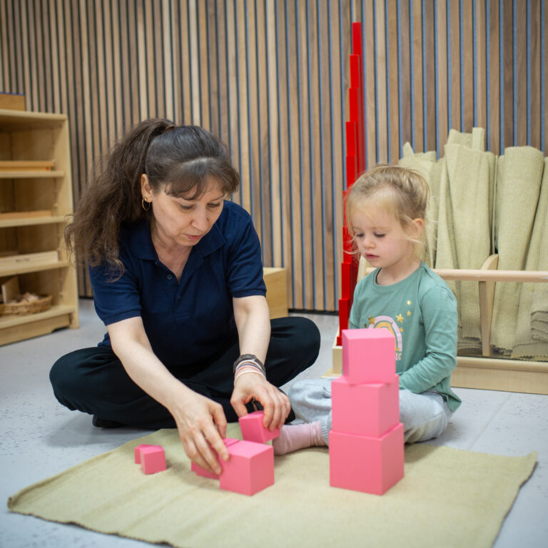 child using building blocks